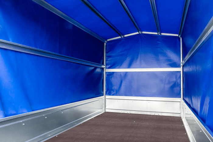 Remorque porte-voitures 230x125 UNITRAILER GARDEN 230 KIPP avec châssis H-1100 et bâche bleue