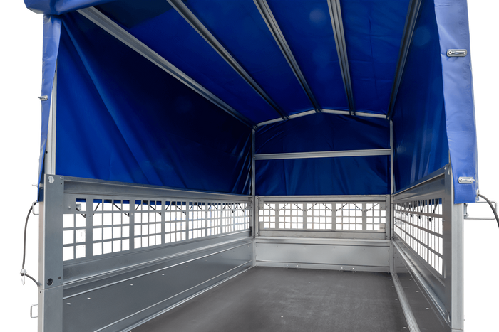 Remorque à un essieu 230x125 UNITRAILER GARDEN 230 KIPP avec côtés en filet, châssis H-800 et bâche bleue
