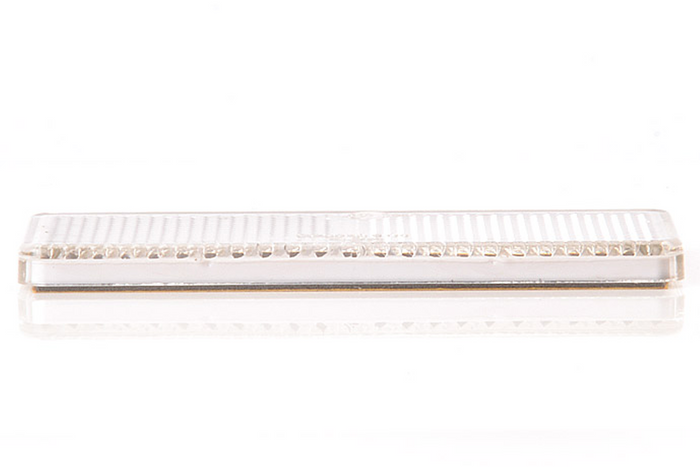Catadioptre blanc 96 x 42 mm avec ruban adhésif